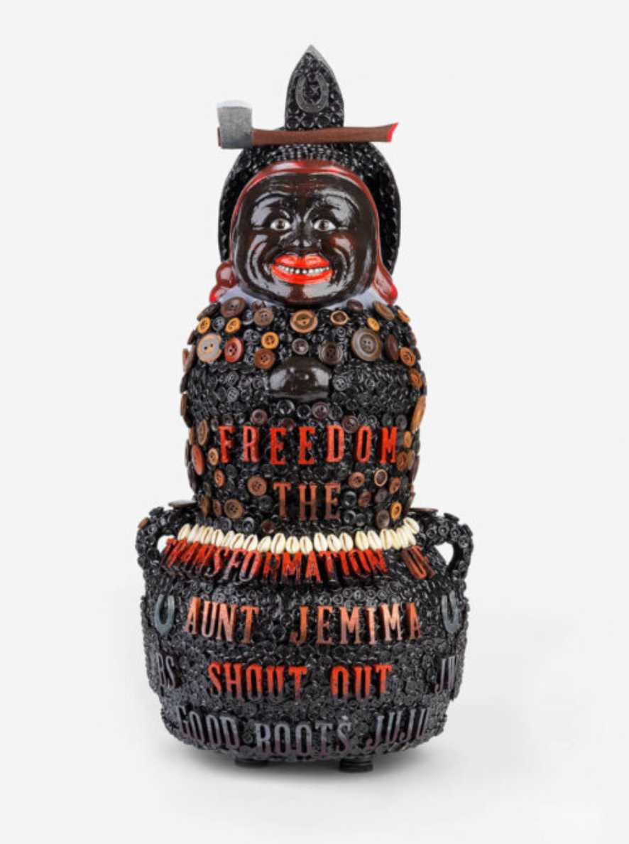 Jar with assemblage art reading “freedom the transformation aunt jemima shout out”